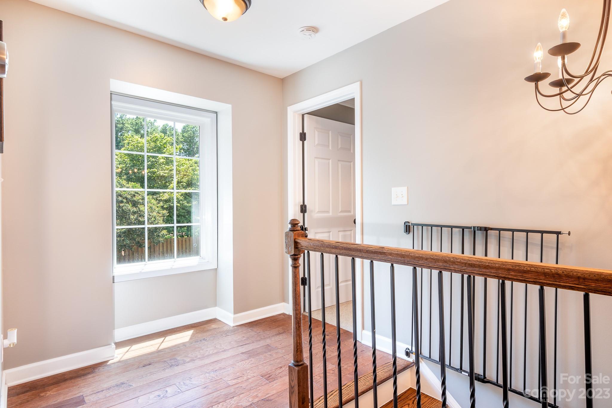3119 Lake Shore Road South Denver, NC 28037 - Photo 24 of 35 a view of a room with wooden floor and windows