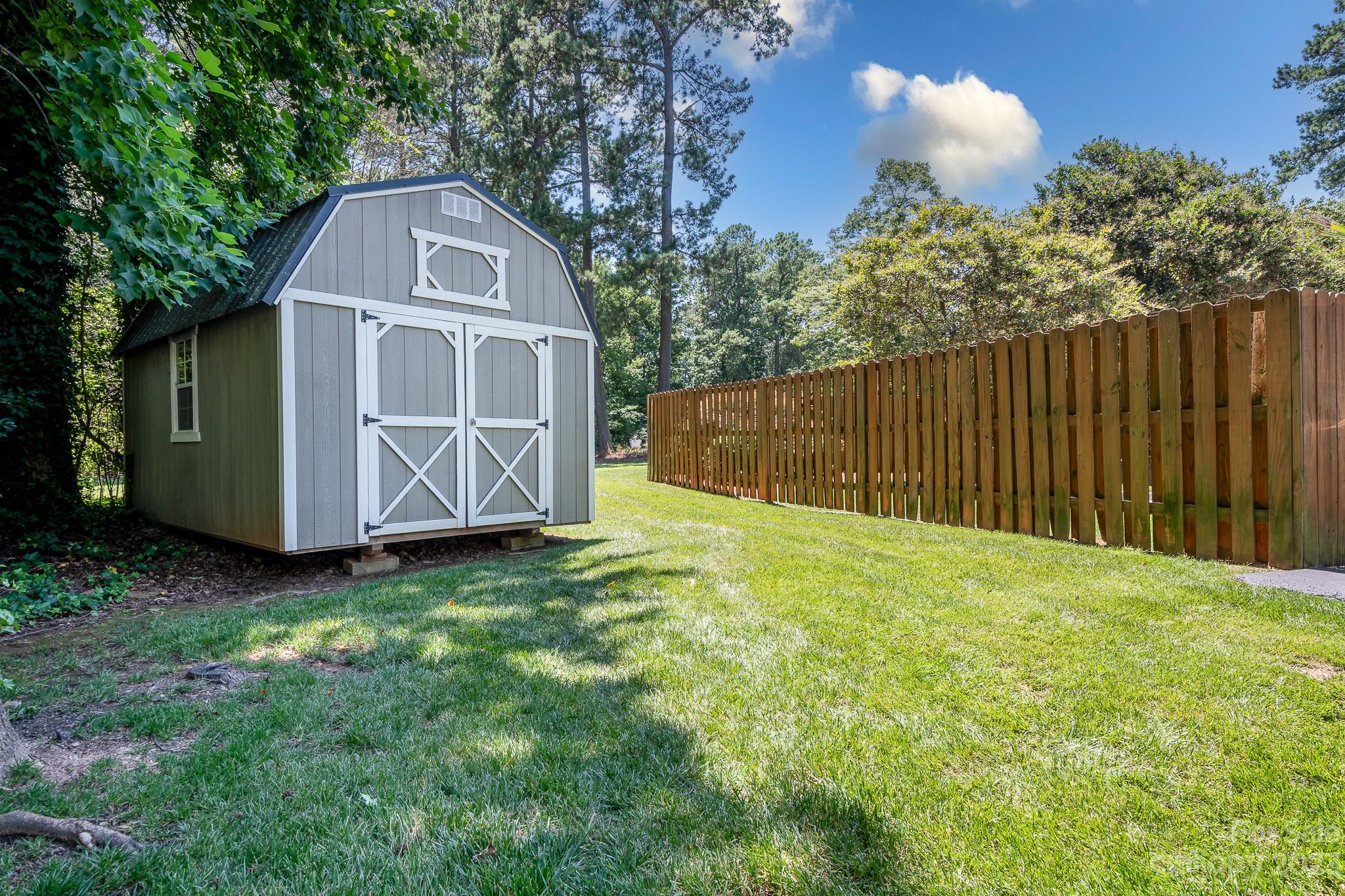 3119 Lake Shore Road South Denver, NC 28037 - Photo 29 of 35 a front view of a house with garden