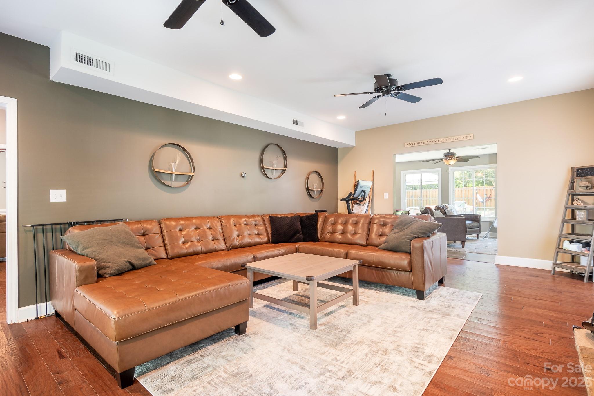 3119 Lake Shore Road South Denver, NC 28037 - Photo 10 of 35 a living room with furniture and wooden floor