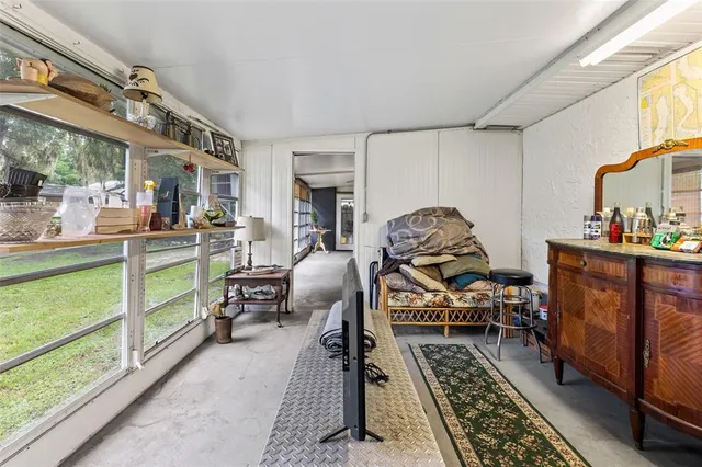 a view of a wooden house with a yard