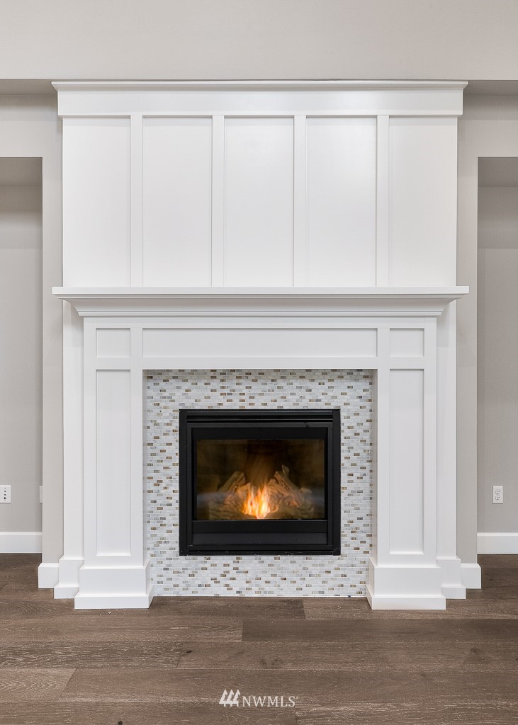 22925 31st Avenue Southeast Bothell, WA 98021 - Photo 6 of 11 a living room with a fireplace