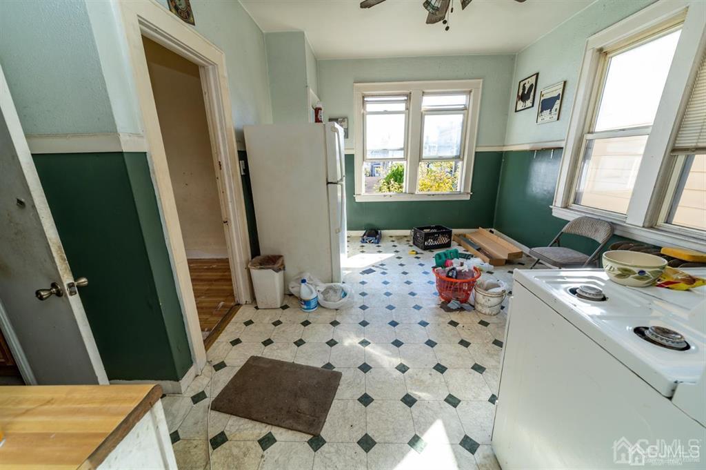 28 Niles Street Elizabeth, NJ 07202 - Photo 21 of 35 a bathroom with a sink vanity and mirror
