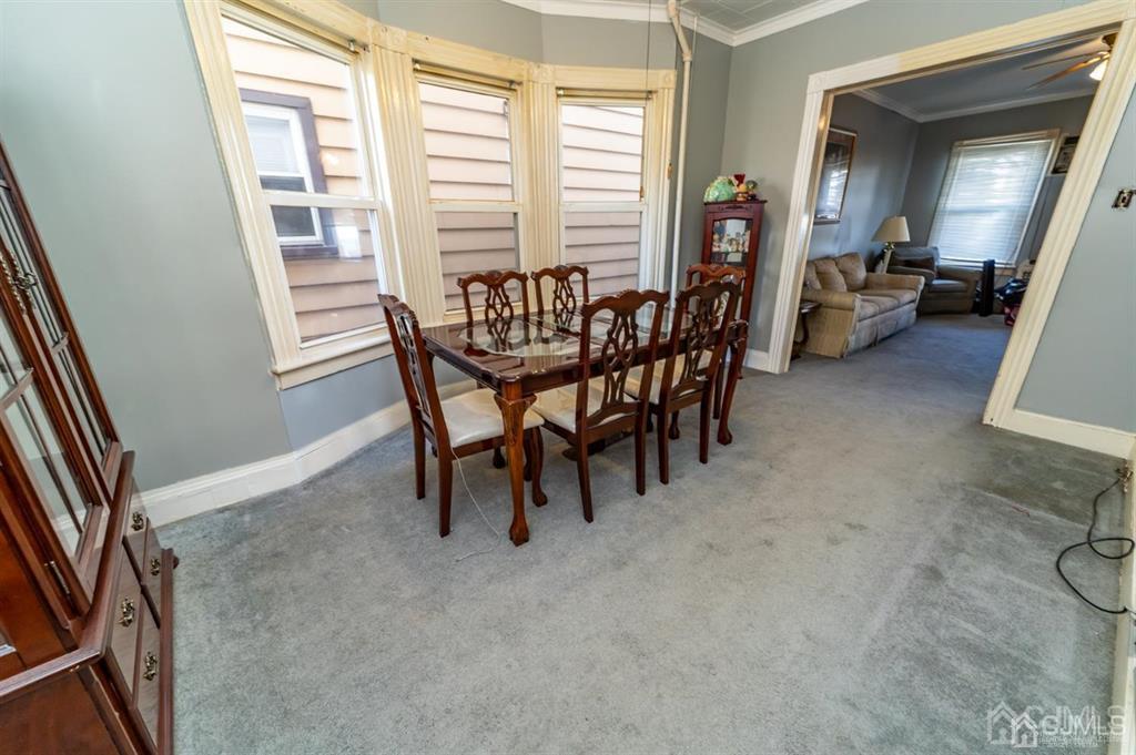28 Niles Street Elizabeth, NJ 07202 - Photo 10 of 35 a view of a livingroom with furniture and windows