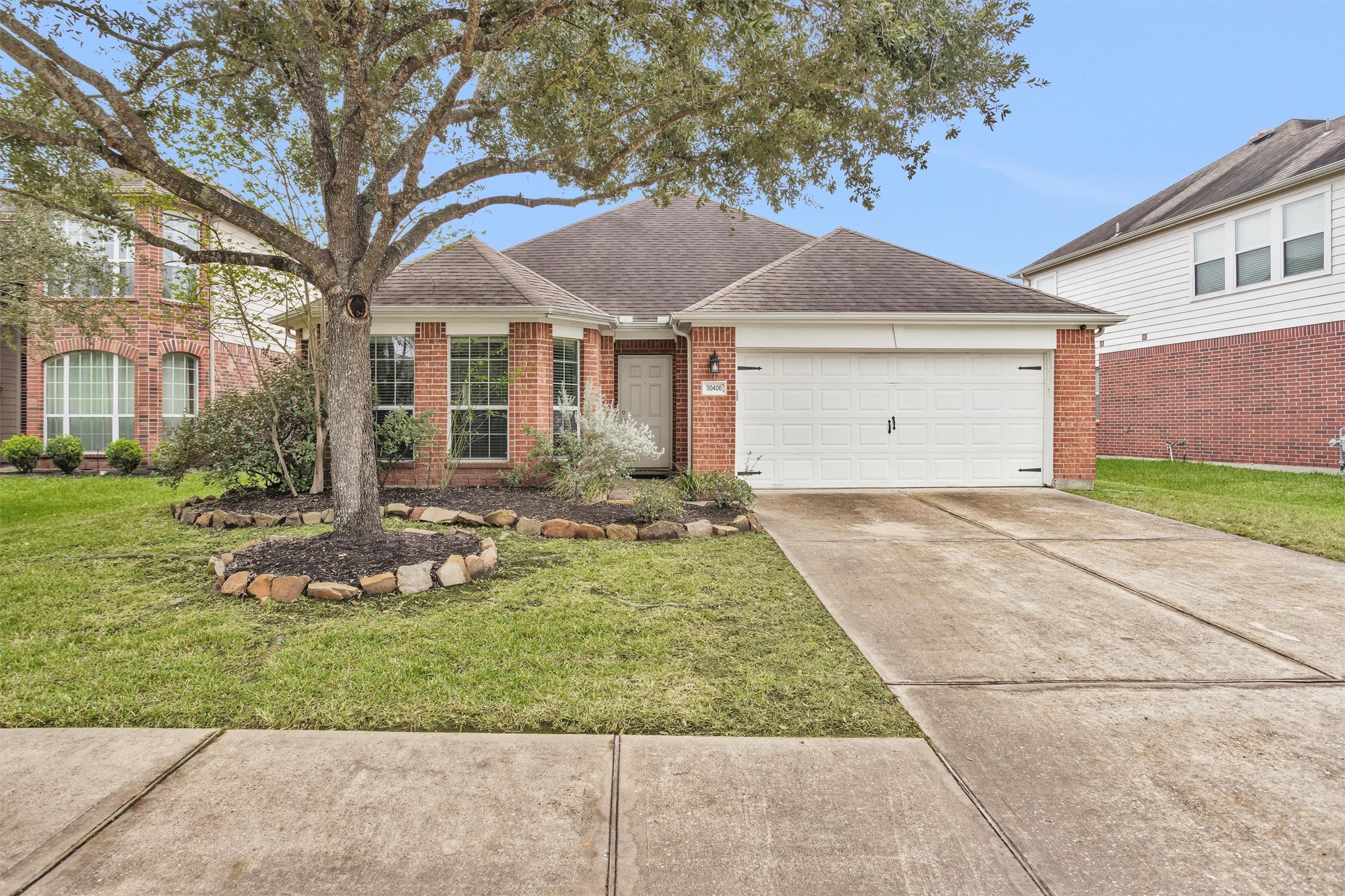 30406 Mesa Valley Drive Spring, TX 77386 - Photo 1 of 29 a front view of a house with a yard