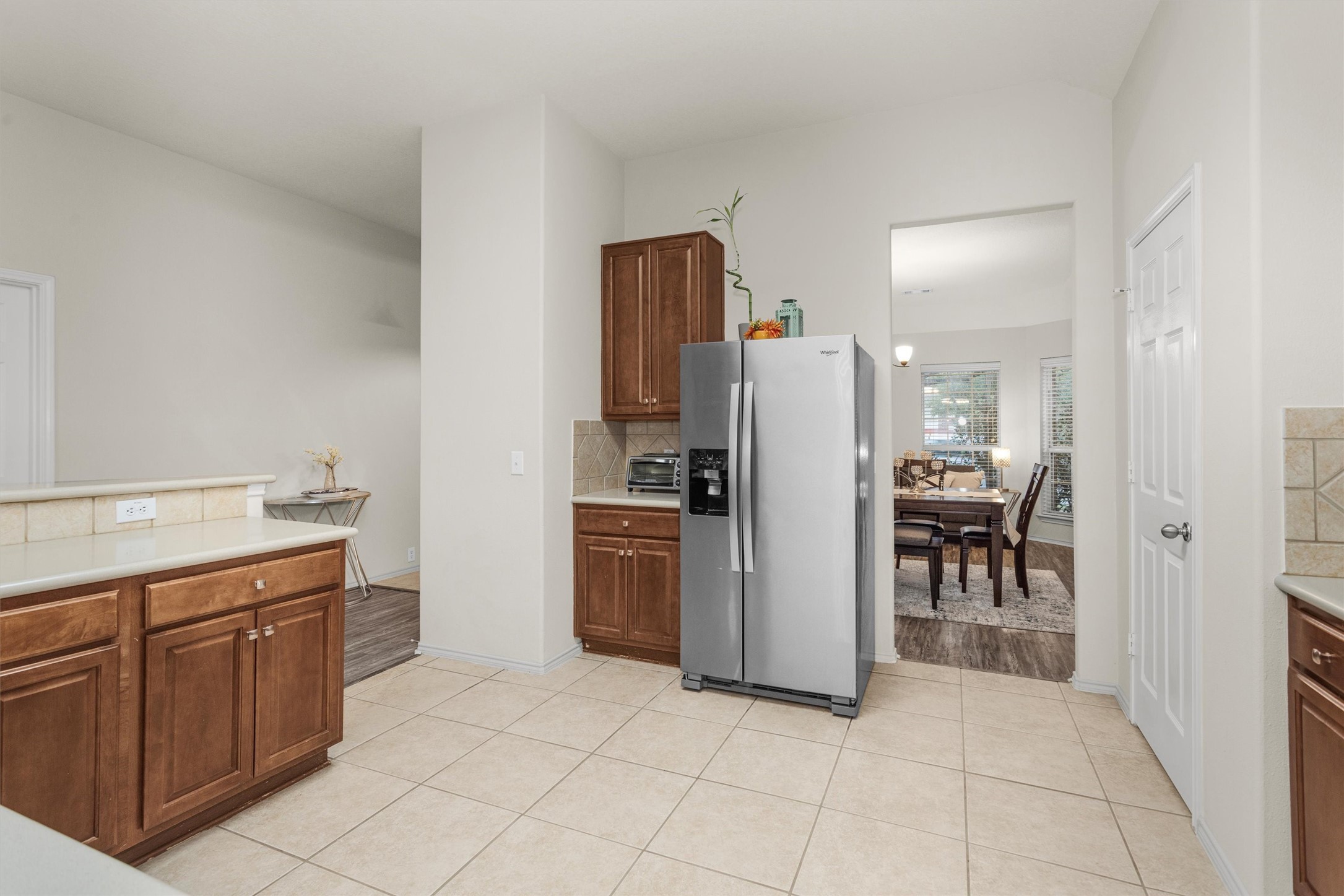 30406 Mesa Valley Drive Spring, TX 77386 - Photo 14 of 29 a kitchen with stainless steel appliances a refrigerator and a sink