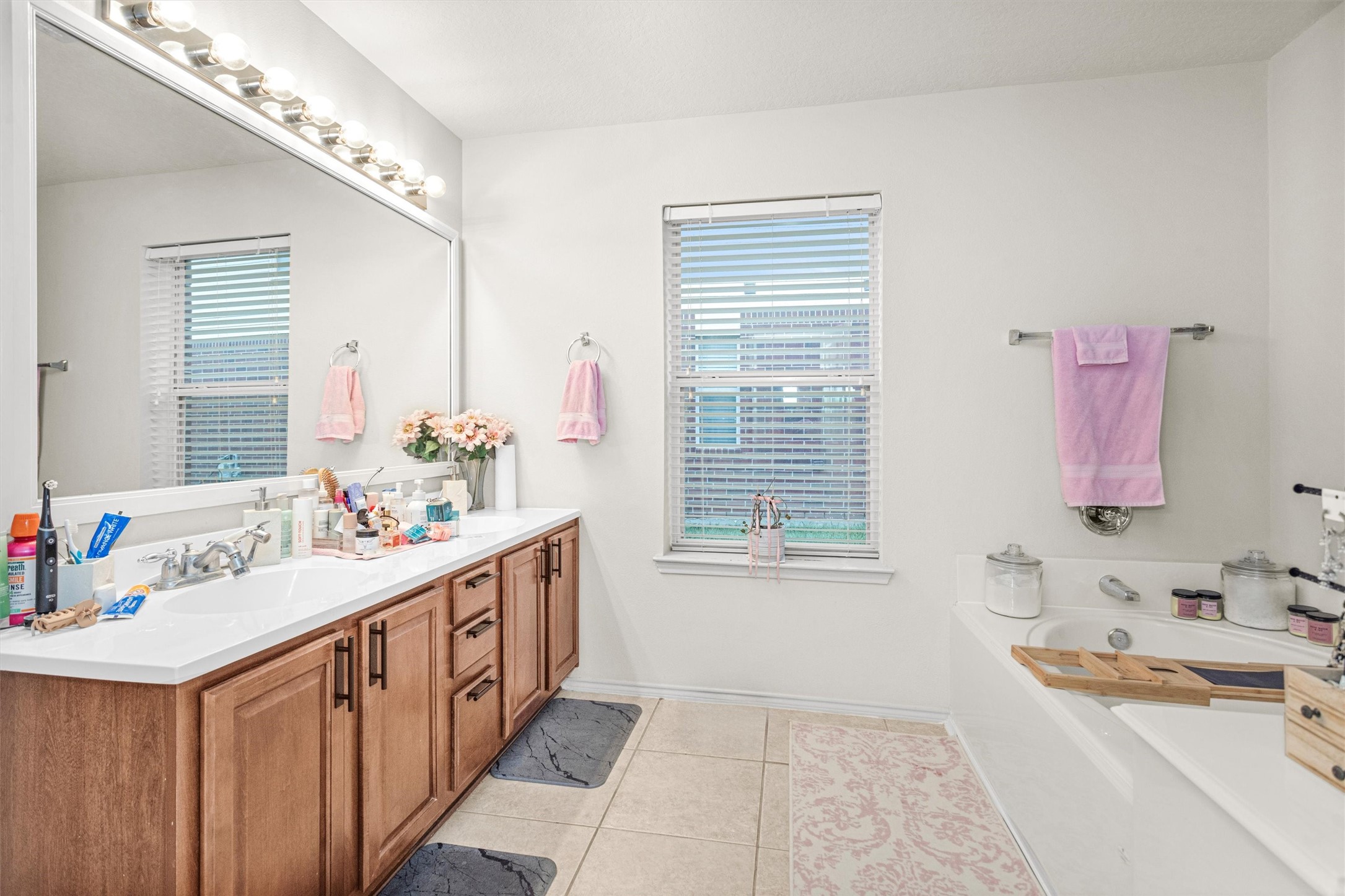 30406 Mesa Valley Drive Spring, TX 77386 - Photo 22 of 29 a bathroom with a sink and a window