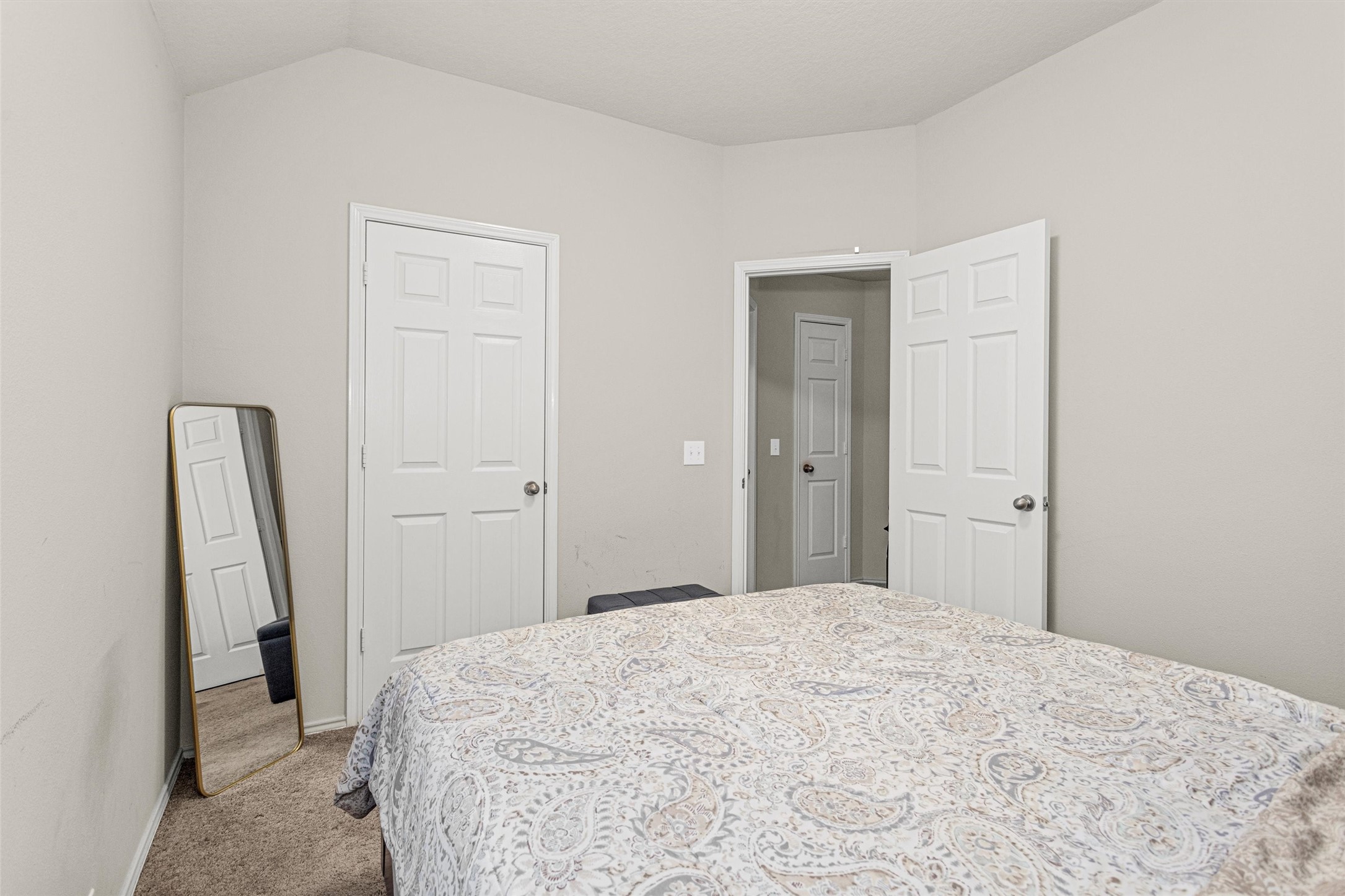 30406 Mesa Valley Drive Spring, TX 77386 - Photo 25 of 29 a bedroom with a bed and a mirror