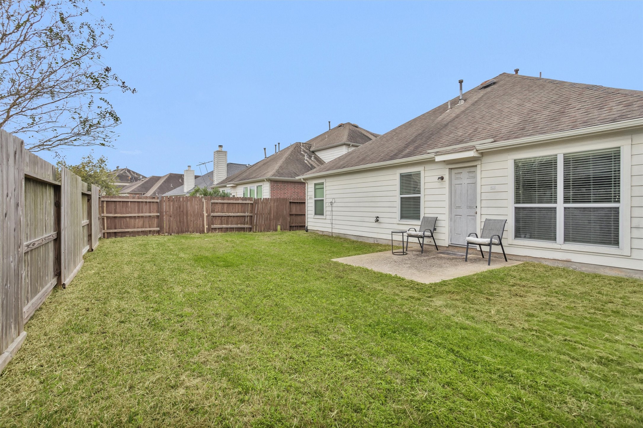 30406 Mesa Valley Drive Spring, TX 77386 - Photo 27 of 29 a view of a house with backyard porch and sitting area