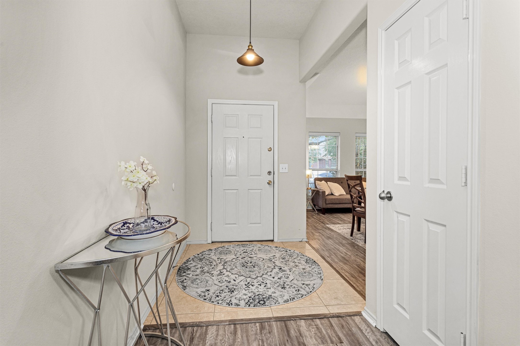 30406 Mesa Valley Drive Spring, TX 77386 - Photo 9 of 29 a view of a hallway with bathroom and wooden floor