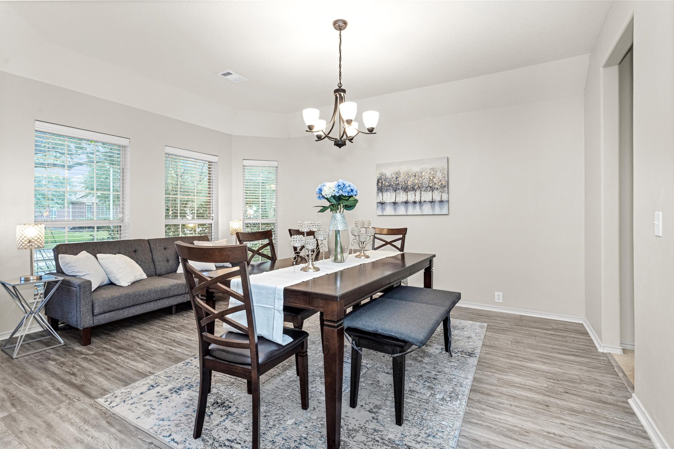 30406 Mesa Valley Drive Spring, TX 77386 - Photo 10 of 29 a view of a a dining room with furniture window and wooden floor