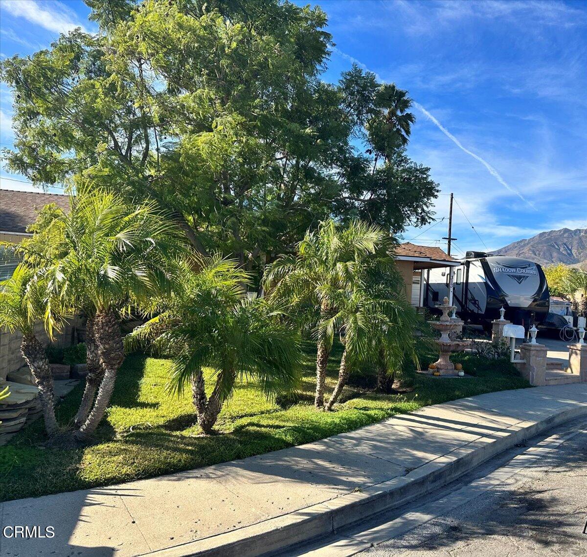 313 Rhodes Court Fillmore, CA 93015 - Photo 1 of 10 a front view of a house with a yard