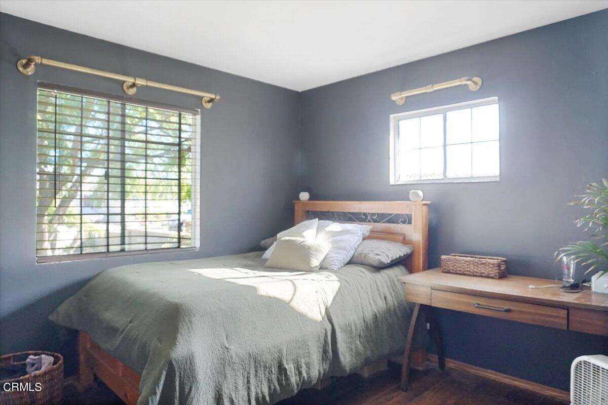 313 Rhodes Court Fillmore, CA 93015 - Photo 7 of 10 a bedroom with a bed and window