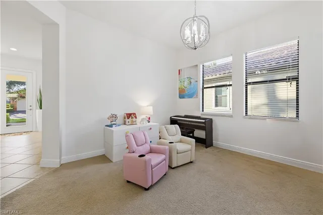 a kitchen with stainless steel appliances a stove a chimney a sink and cabinets
