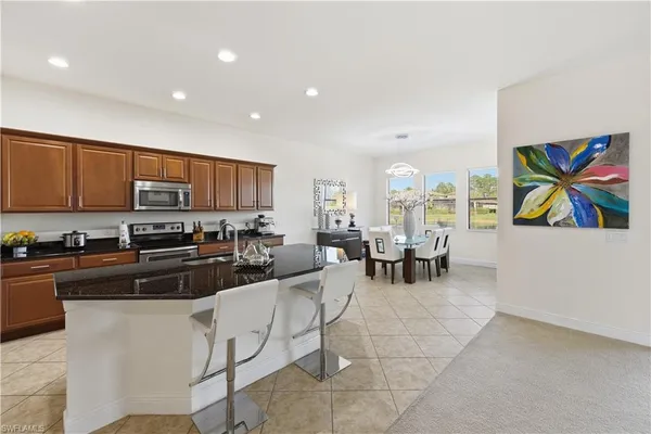 a kitchen with stainless steel appliances lots of counter top space