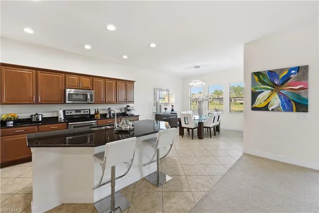 a kitchen with stainless steel appliances lots of counter top space