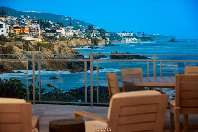 a terrace of a house with outdoor seating
