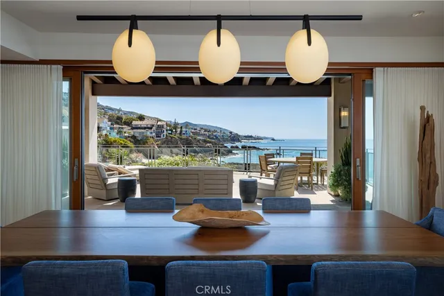 a kitchen with a table and chairs