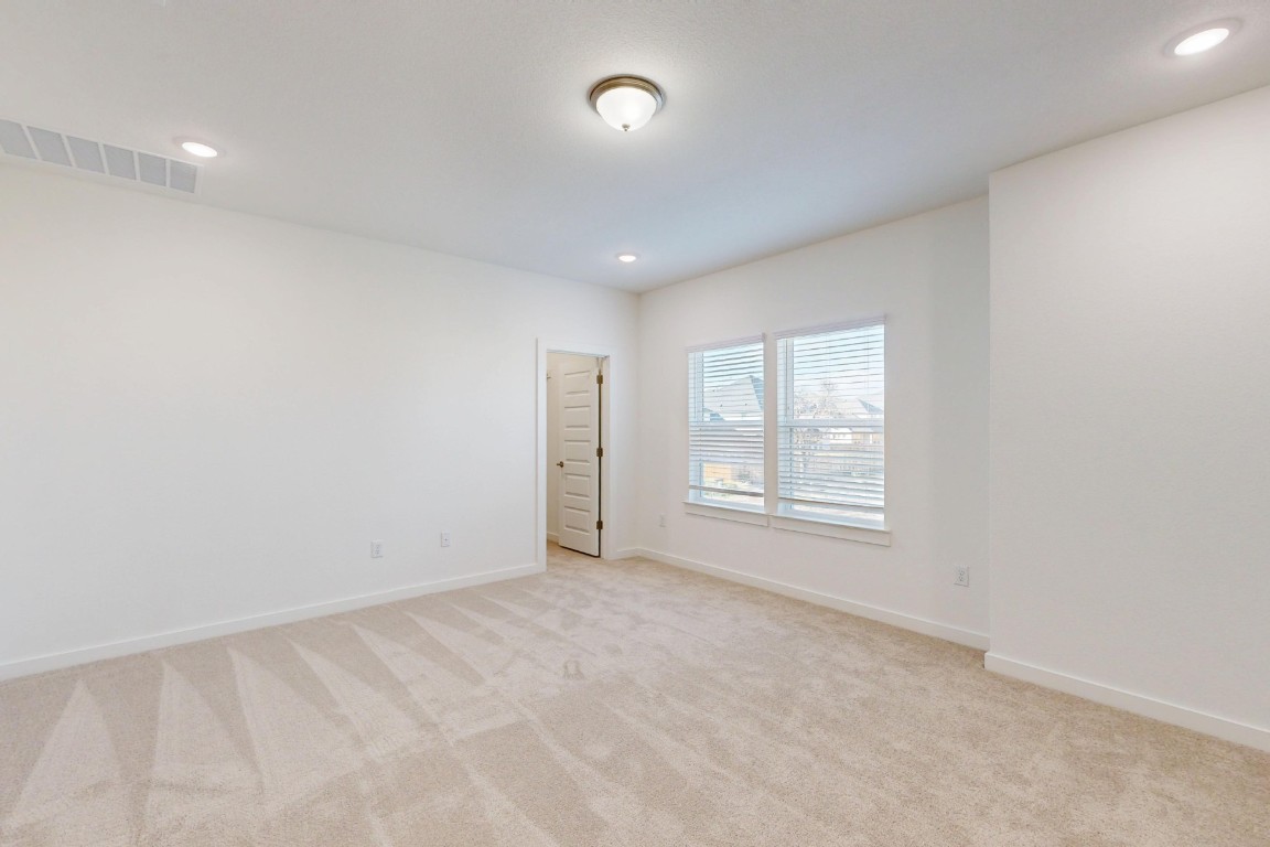 3944 Fulton Drive Leander, TX 78641 - Photo 16 of 23 a view of an empty room with a window