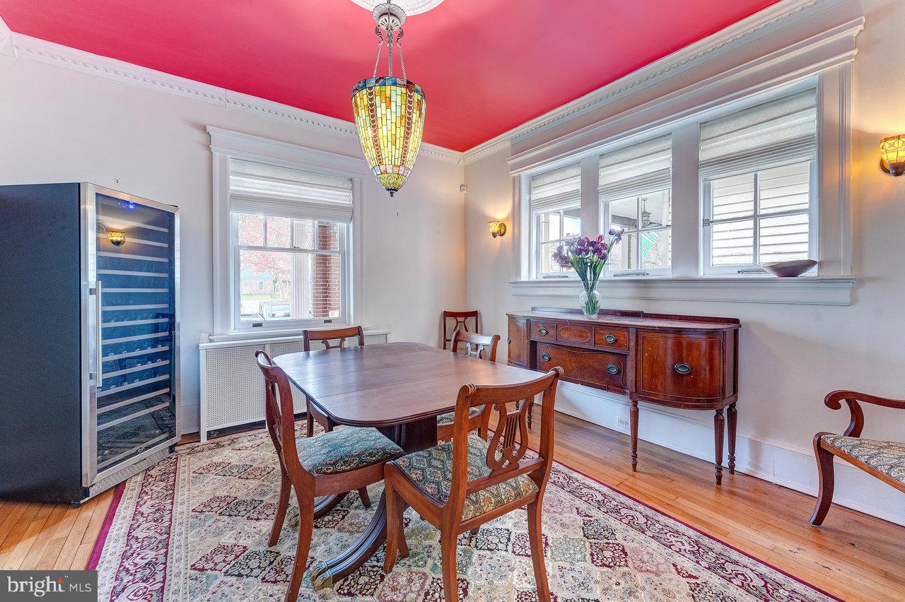 925 Berkeley Avenue Trenton, NJ 08618 - Photo 11 of 36 a dining room with furniture a chandelier and window