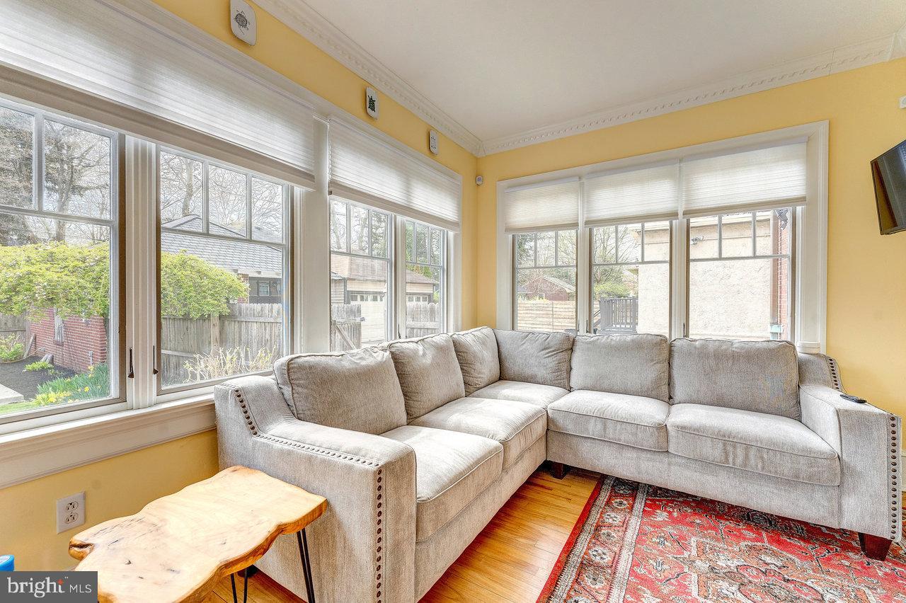 925 Berkeley Avenue Trenton, NJ 08618 - Photo 16 of 36 a living room with furniture and a large window