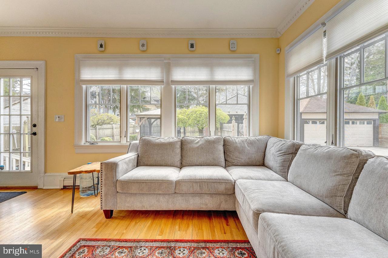 925 Berkeley Avenue Trenton, NJ 08618 - Photo 17 of 36 a living room with furniture and a large window