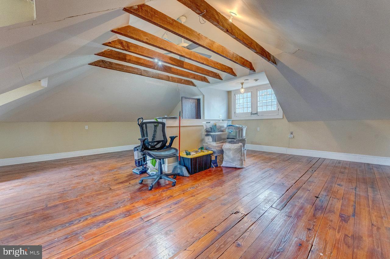 925 Berkeley Avenue Trenton, NJ 08618 - Photo 26 of 36 a workspace with furniture and wooden floor