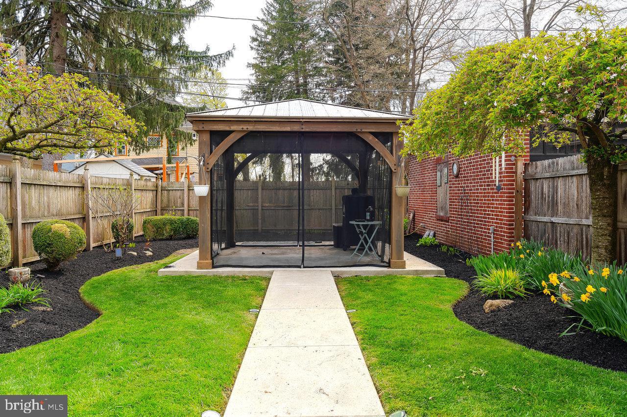 925 Berkeley Avenue Trenton, NJ 08618 - Photo 29 of 36 a view of a house with a yard