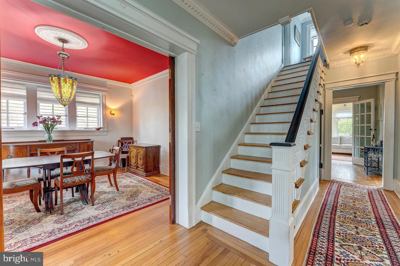 925 Berkeley Avenue Trenton, NJ 08618 - Photo 5 of 36 a view of a dining room with furniture and a rug