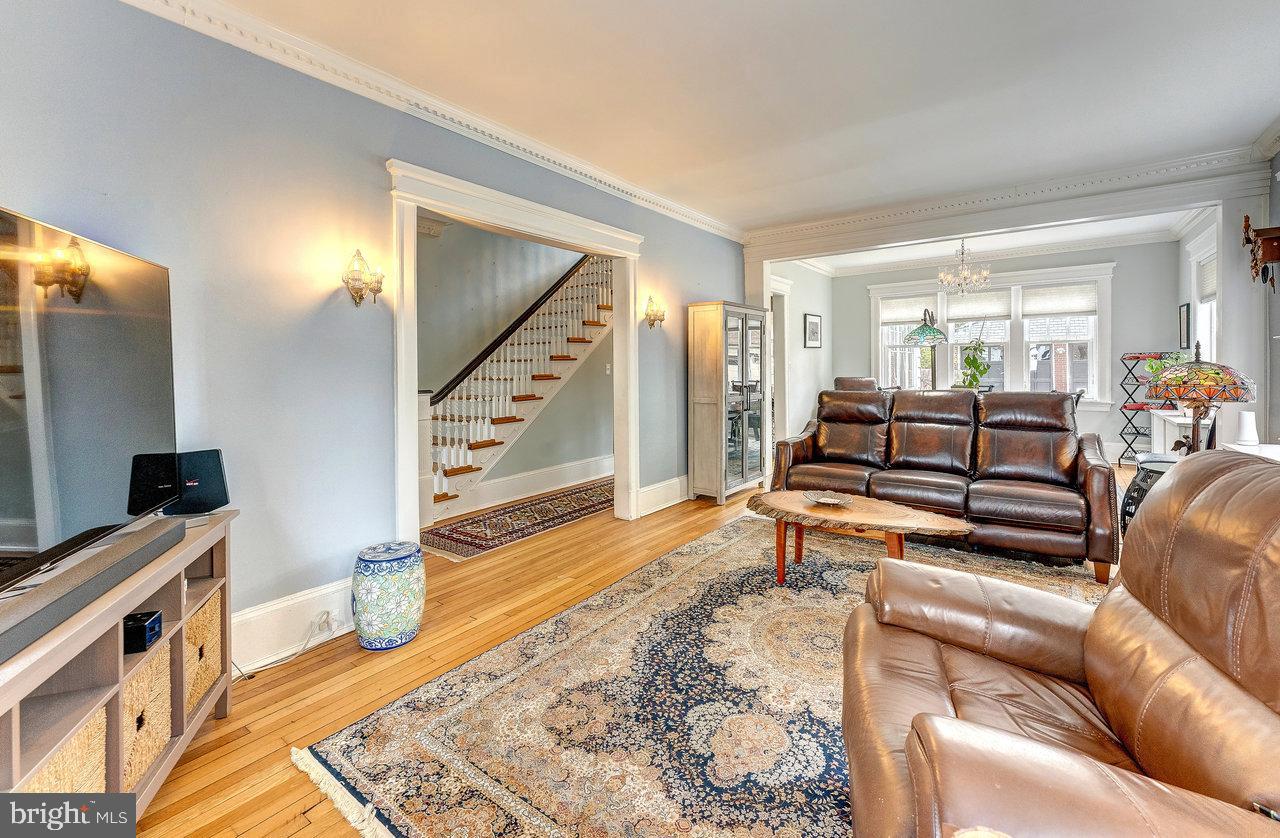 925 Berkeley Avenue Trenton, NJ 08618 - Photo 6 of 36 a living room with furniture and a flat screen tv