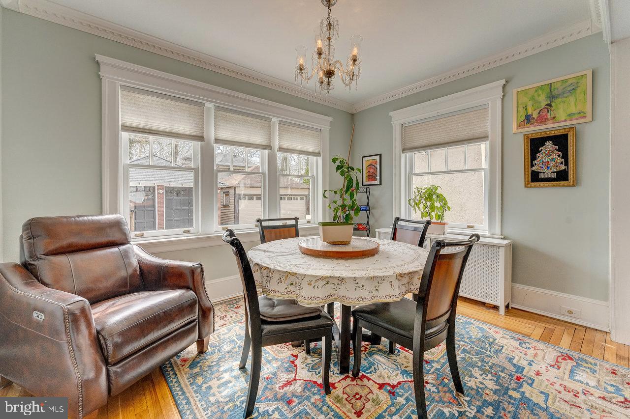 925 Berkeley Avenue Trenton, NJ 08618 - Photo 8 of 36 a view of a dining room with furniture window and wooden floor
