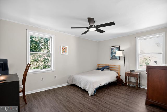 a view of a livingroom with furniture and wooden floor