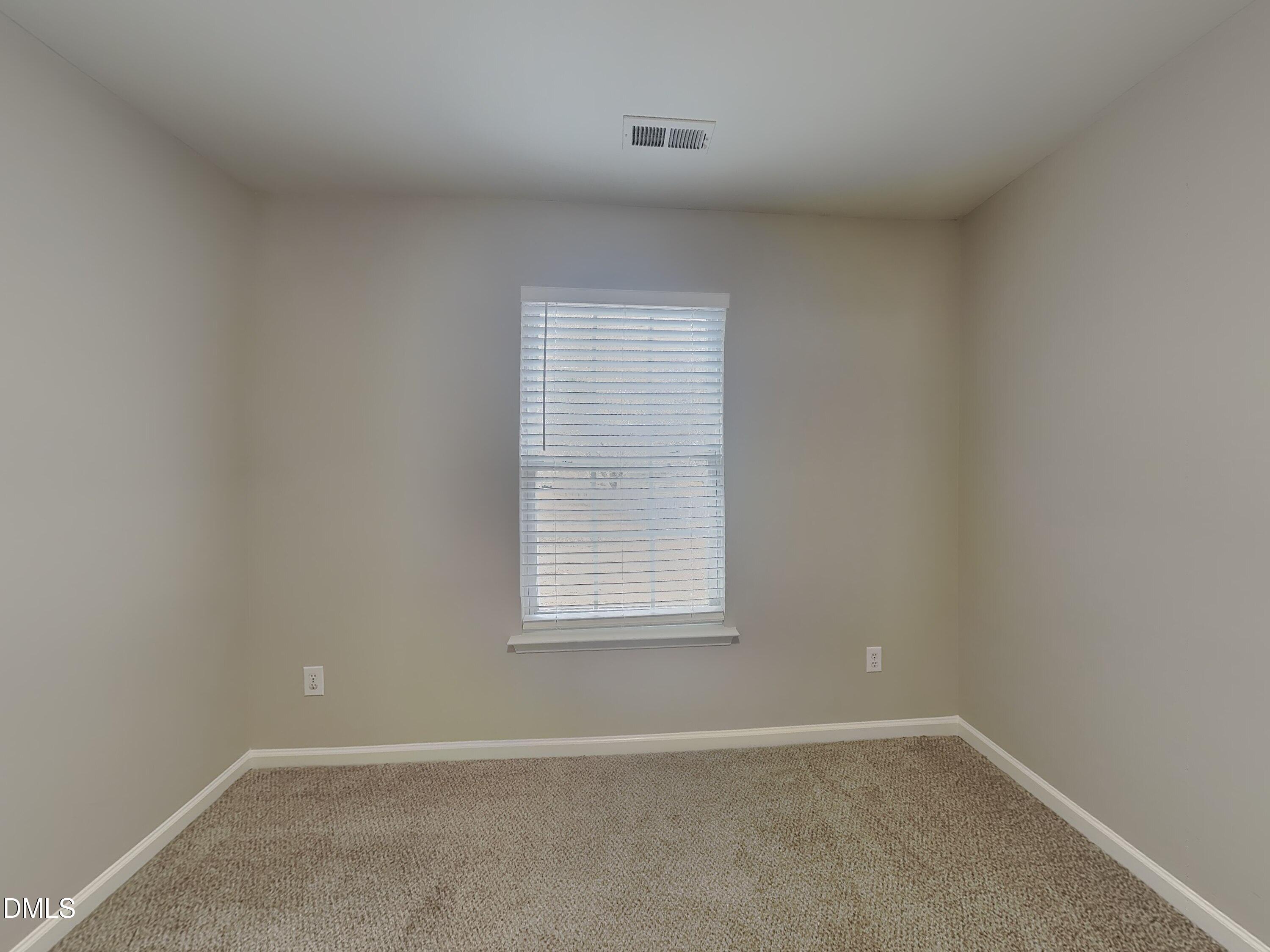 3101 Rendezvous Drive Raleigh, NC 27610 - Photo 13 of 18 an empty room with a window