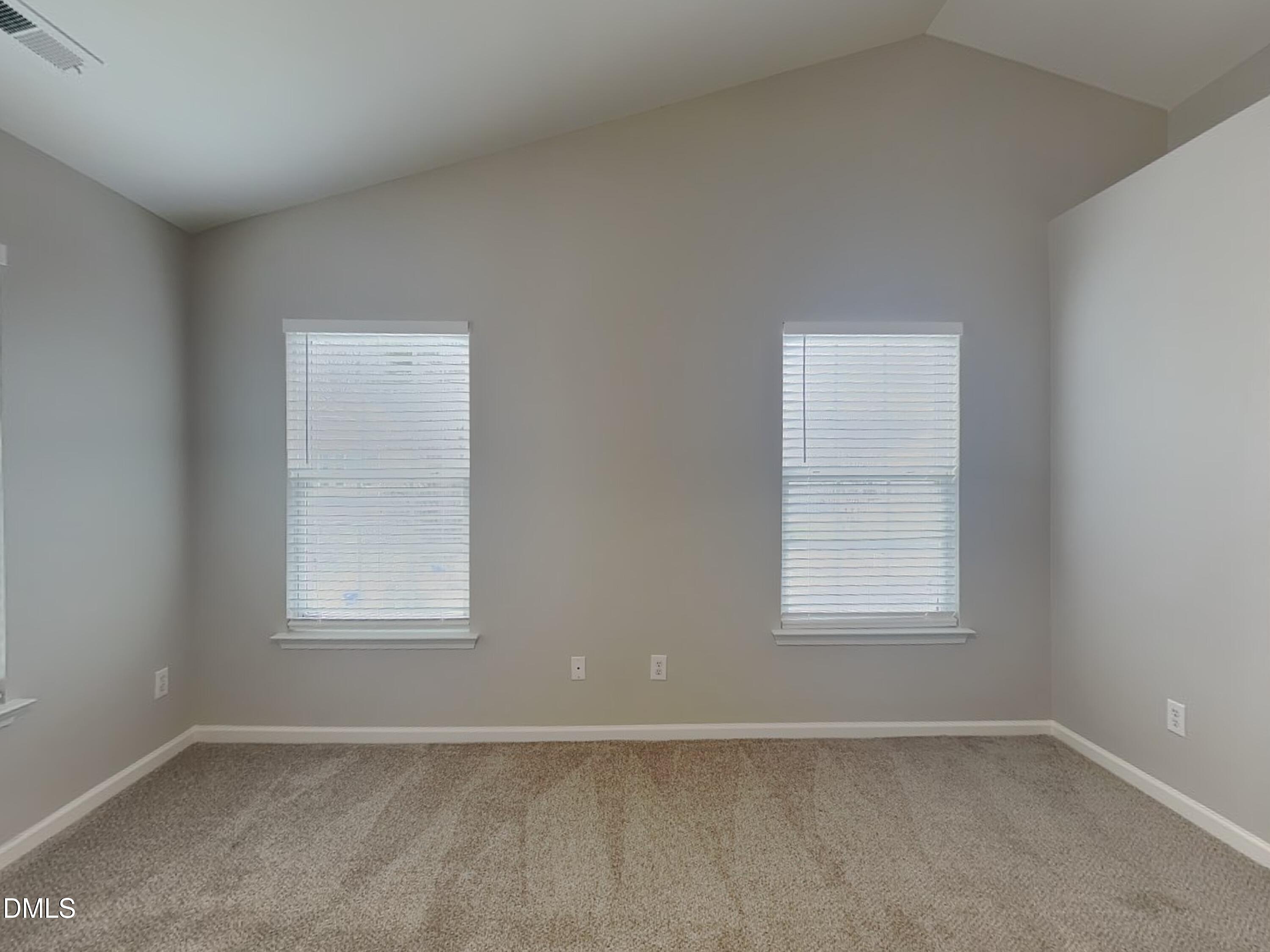 3101 Rendezvous Drive Raleigh, NC 27610 - Photo 10 of 18 an empty room with windows