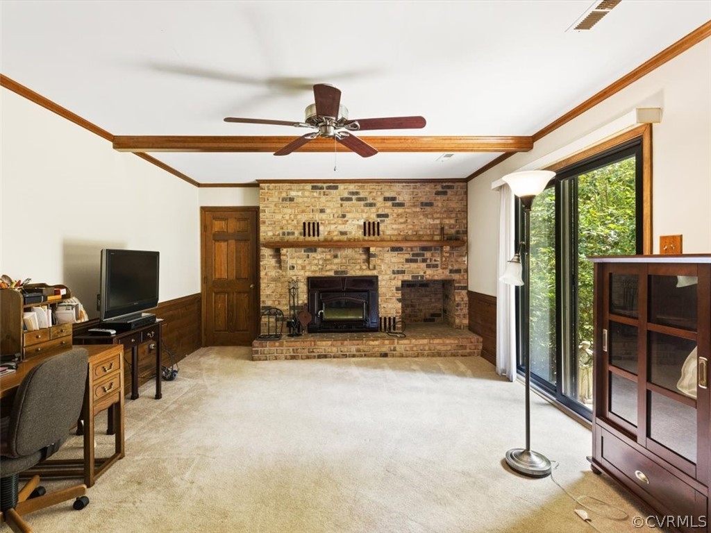 1614 Blakely Road Crozier, VA 23039 - Photo 14 of 33 a view of a livingroom with furniture a fireplace and window