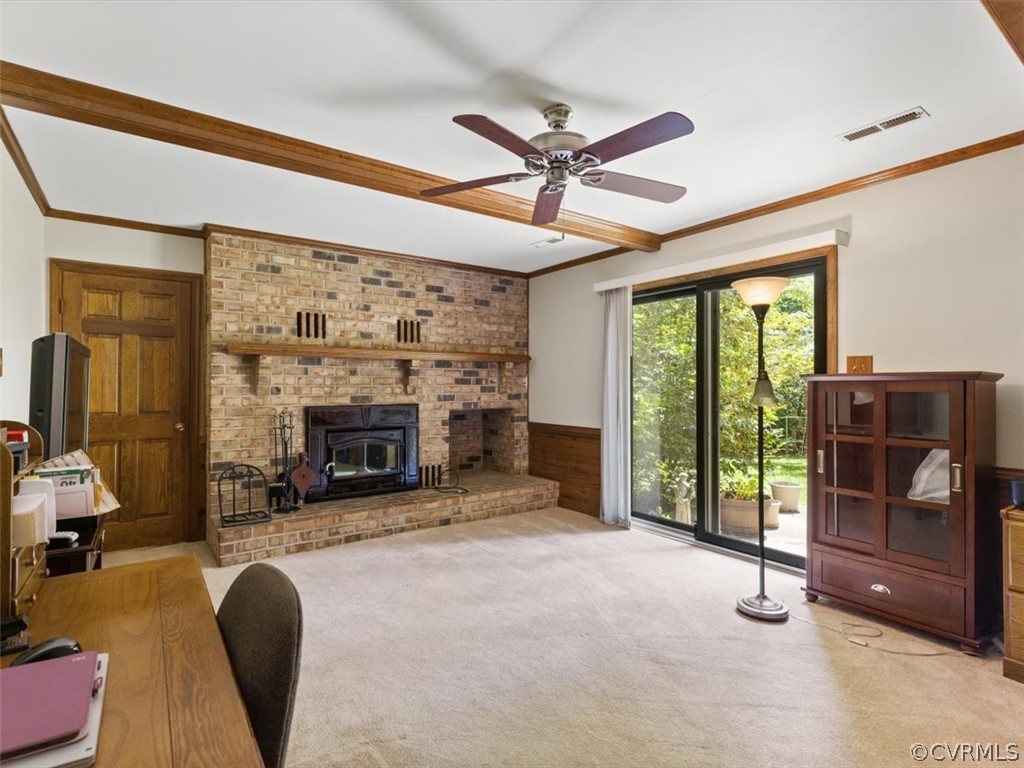 1614 Blakely Road Crozier, VA 23039 - Photo 15 of 33 a living room with furniture and a fireplace