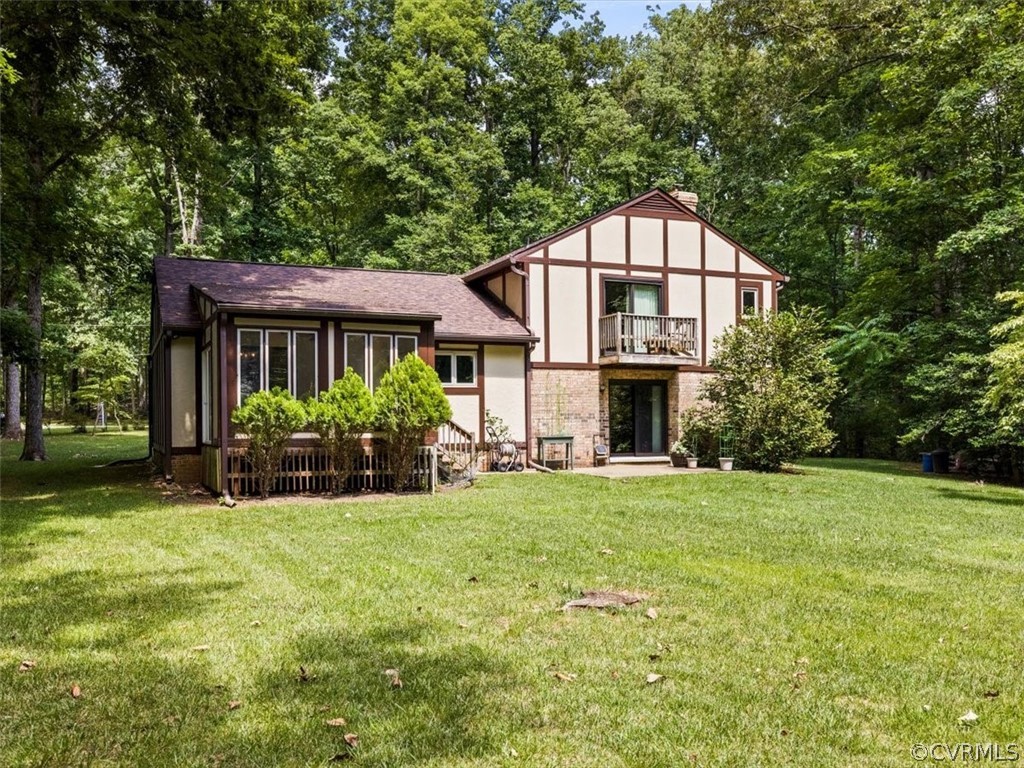 1614 Blakely Road Crozier, VA 23039 - Photo 30 of 33 a front view of a house with a yard and porch