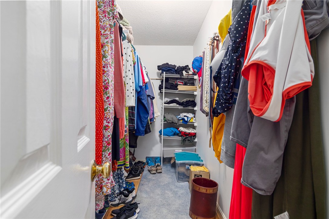 5390 Post Road, Unit 4 East Greenwich, RI 02818 - Photo 24 of 35 Plenty of storage in the master bedroom, walk in closet.
