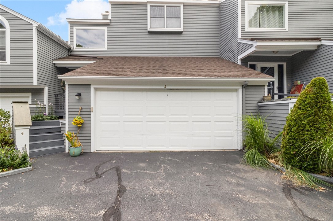 5390 Post Road, Unit 4 East Greenwich, RI 02818 - Photo 34 of 35 This home also offers a two car garage and additional, onsite parking.