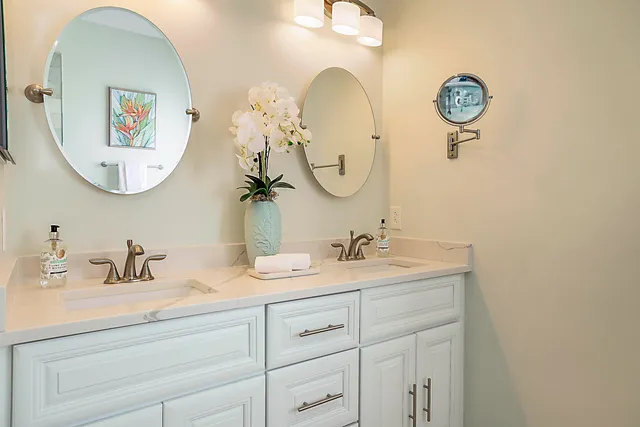 a bathroom with a bathtub and shower