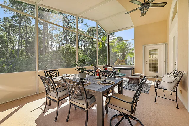 a backyard of a house with outdoor seating