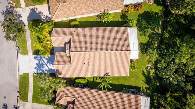 a view of a house with a street