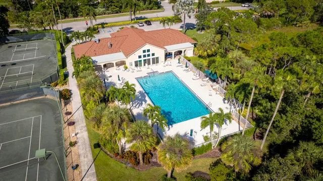 an aerial view of residential house with outdoor space