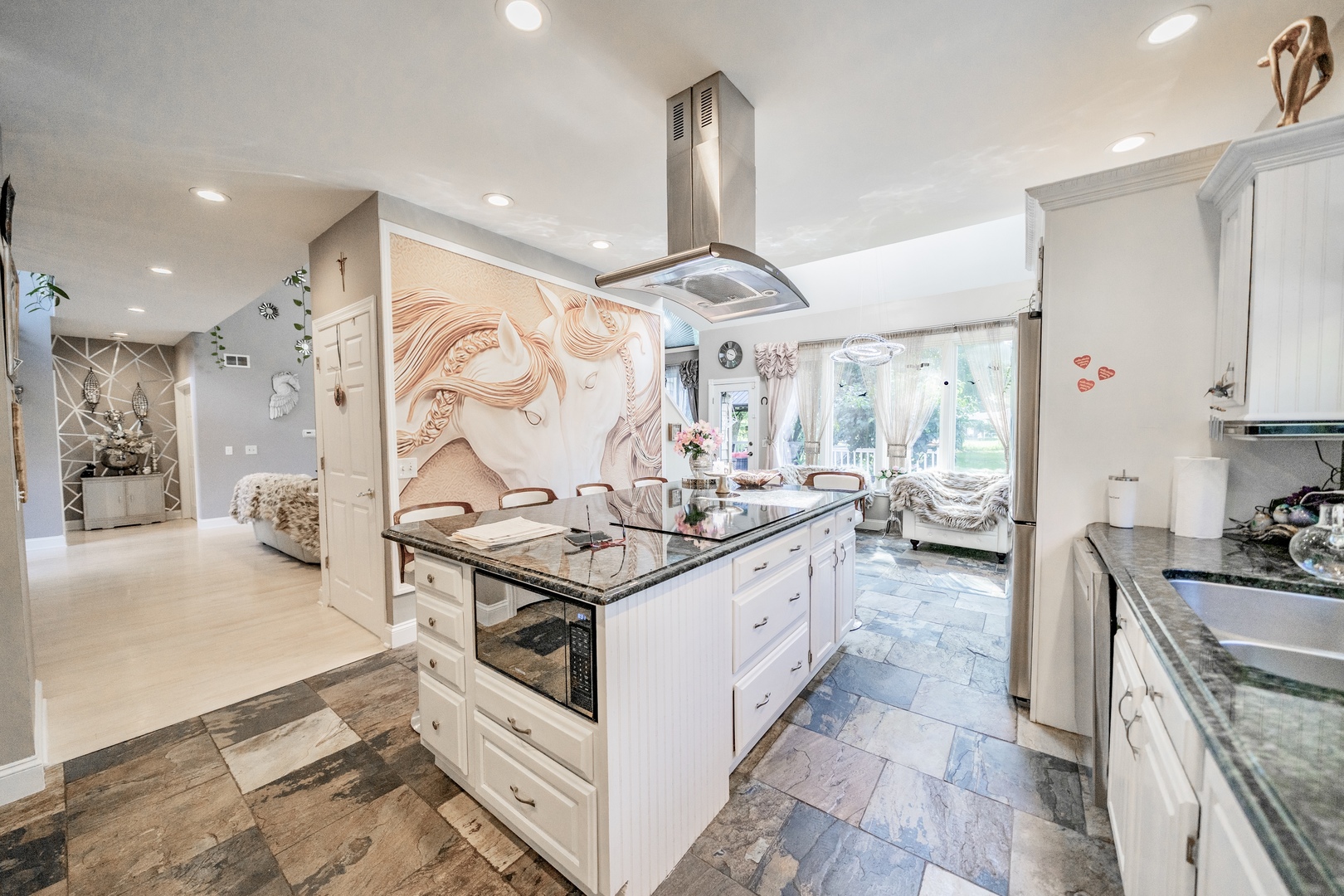 9817 North Hunters Lane Spring Grove, IL 60081 - Photo 11 of 73 a kitchen with stainless steel appliances granite countertop a sink stove and cabinets