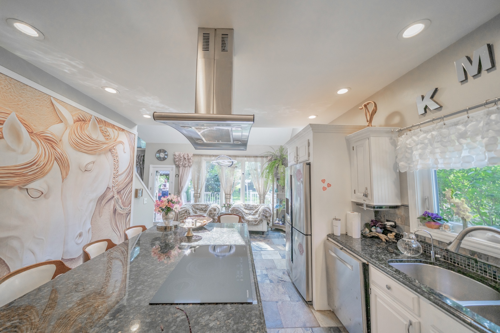 9817 North Hunters Lane Spring Grove, IL 60081 - Photo 14 of 73 a kitchen with stainless steel appliances a sink a stove a chimney a refrigerator and cabinets