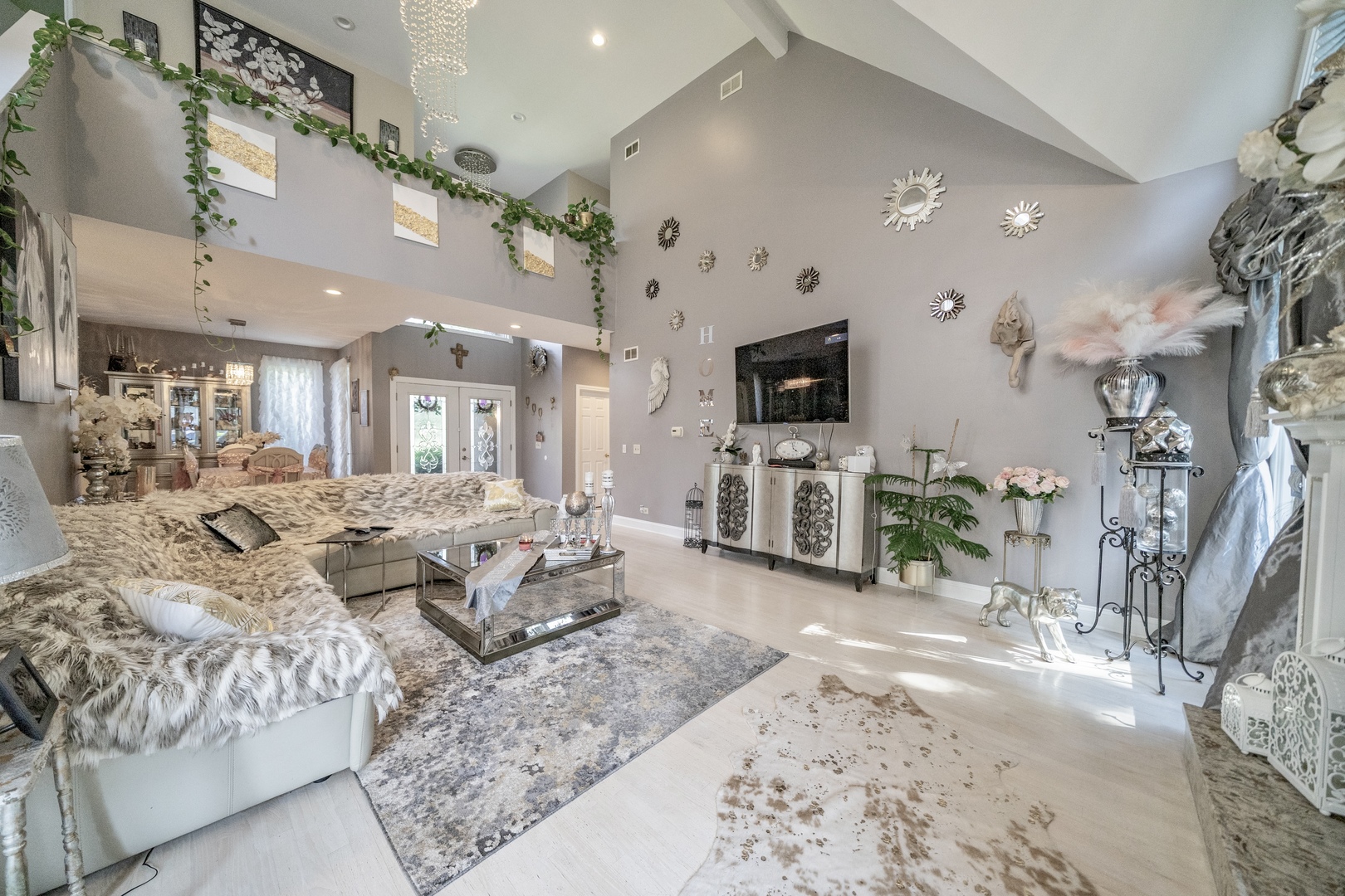 9817 North Hunters Lane Spring Grove, IL 60081 - Photo 3 of 73 a living room with furniture and a flat screen tv