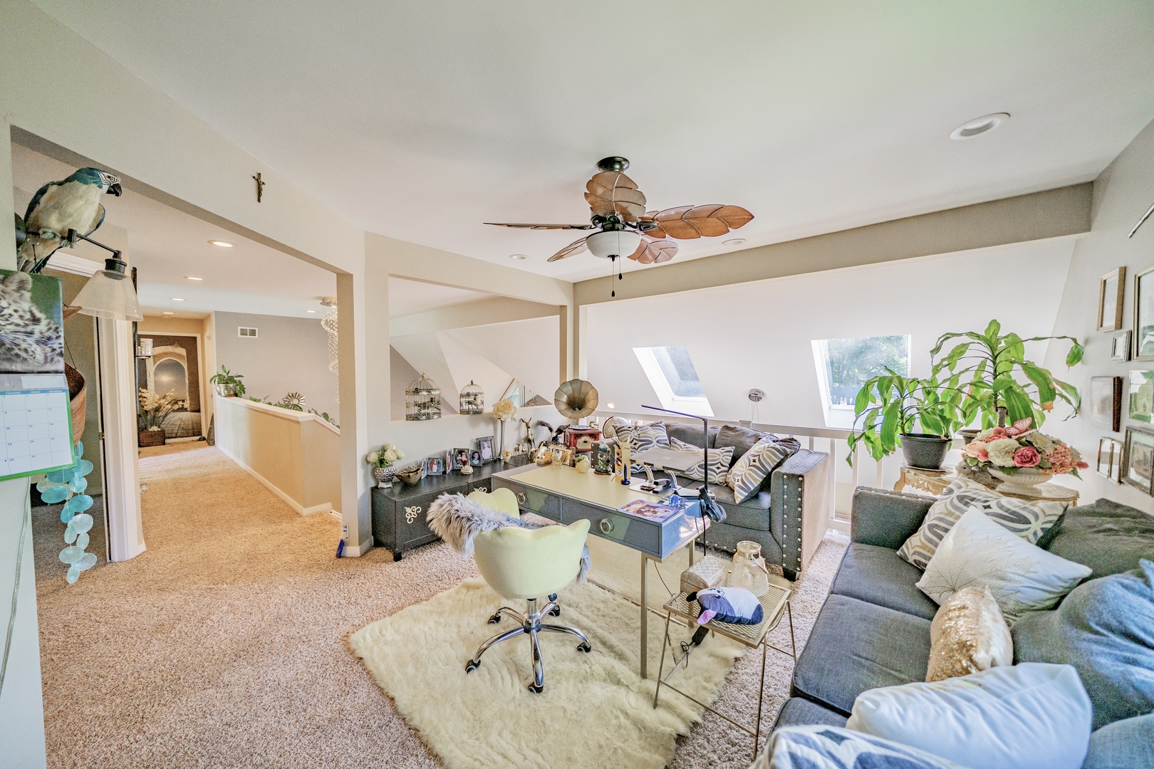 9817 North Hunters Lane Spring Grove, IL 60081 - Photo 32 of 73 a living room with furniture a chandelier and a dining table