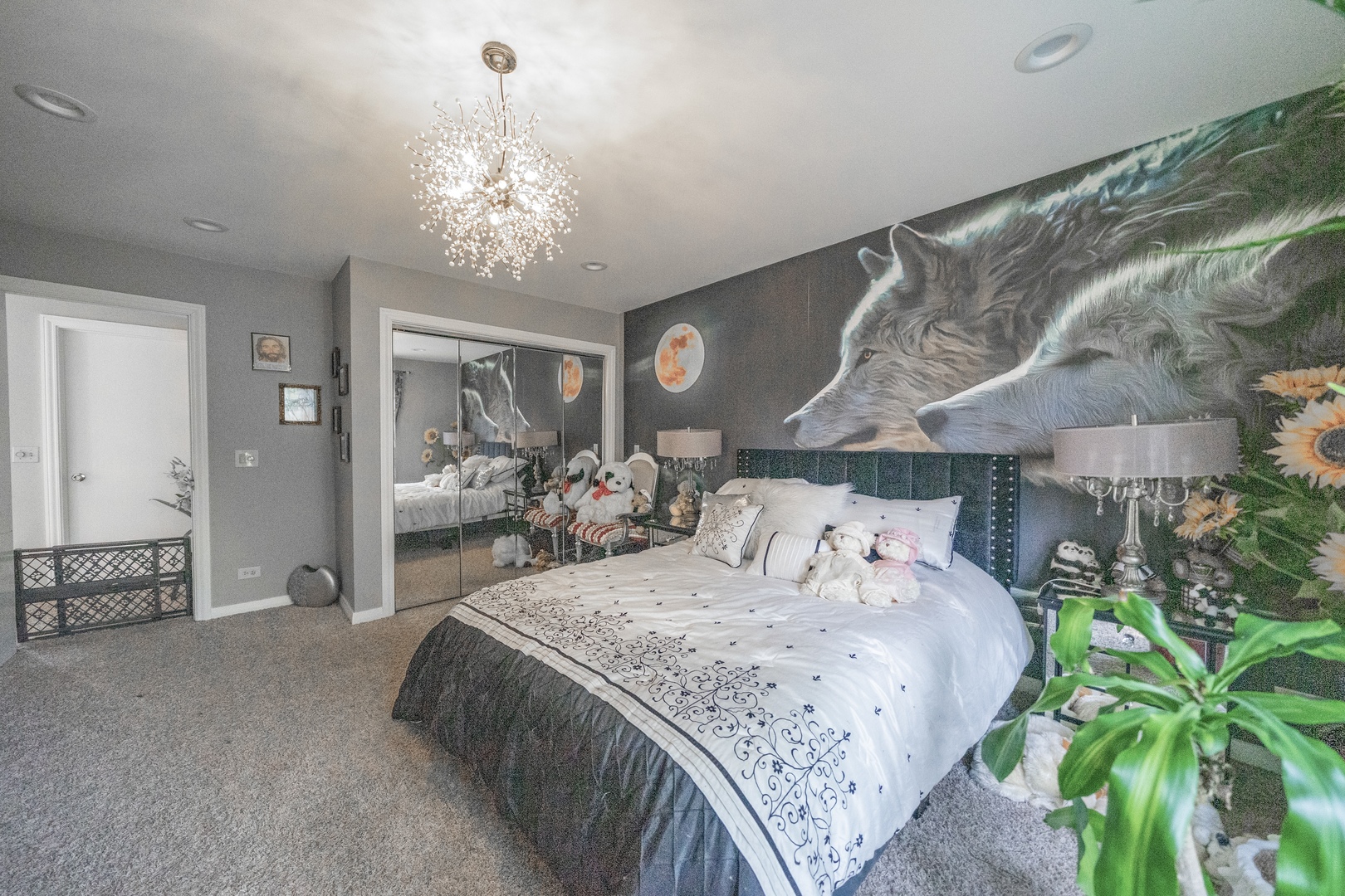 9817 North Hunters Lane Spring Grove, IL 60081 - Photo 36 of 73 a bedroom with bed and a chandelier