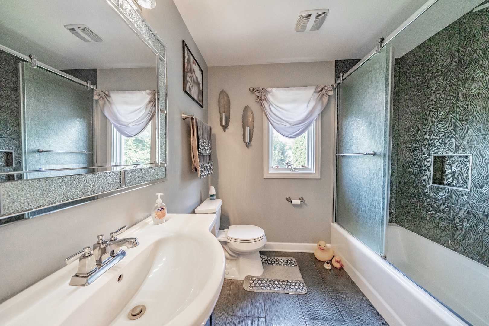 9817 North Hunters Lane Spring Grove, IL 60081 - Photo 43 of 73 a bathroom with a sink a toilet and a bathtub