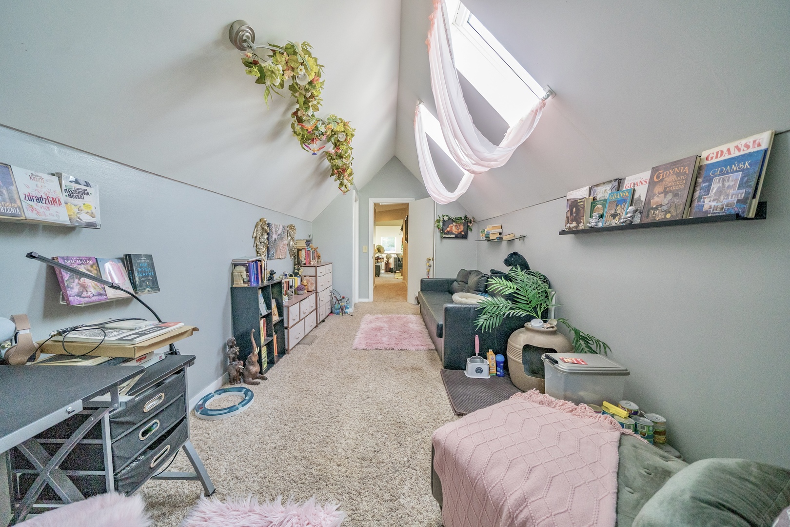 9817 North Hunters Lane Spring Grove, IL 60081 - Photo 45 of 73 a living room with furniture gym equipment and a chandelier