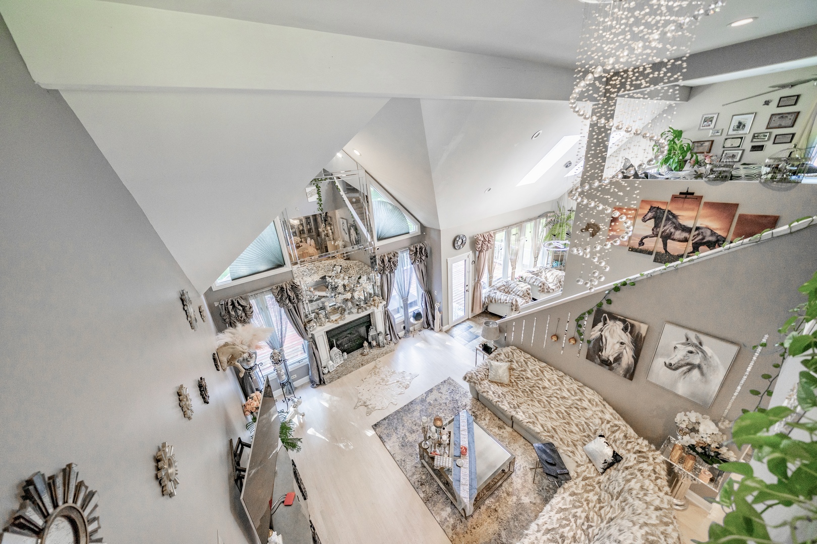 9817 North Hunters Lane Spring Grove, IL 60081 - Photo 49 of 73 a view of a living room with furniture and a chandelier